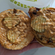 Pollo Campero grilled chicken sandwich with top bun removed to show sauce